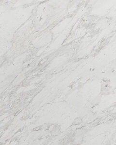 Calacatta Cream natural stone with warm ivory background and soft veining, ideal for luxury interiors and statement surfaces