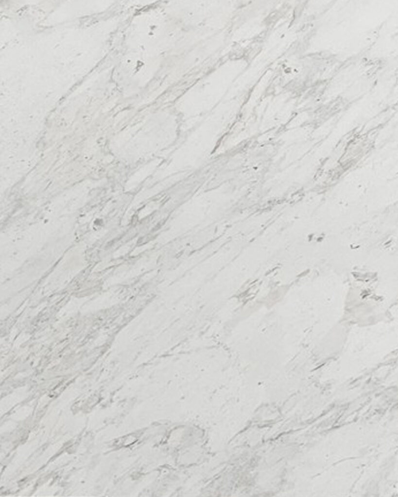 Calacatta Cream natural stone with warm ivory background and soft veining, ideal for luxury interiors and statement surfaces