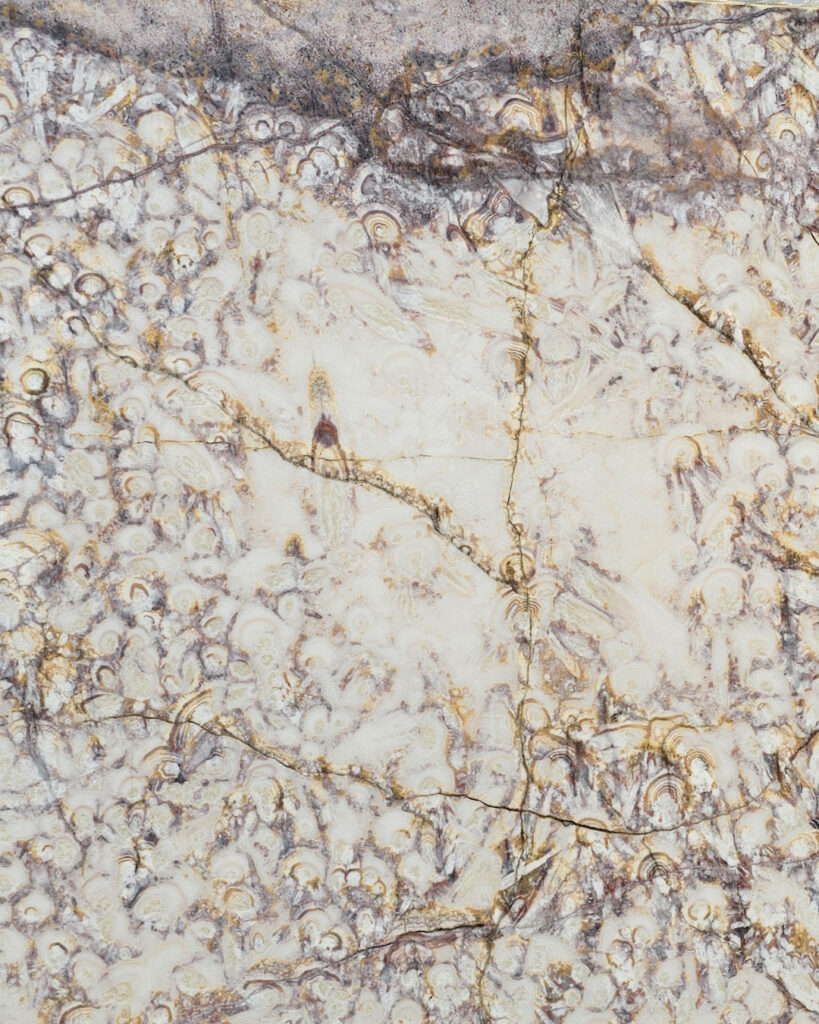 Purple onyx natural stone with rich violet tones and translucent depth, ideal for backlit feature walls and luxury design